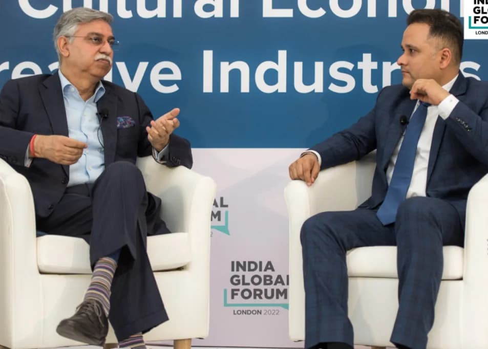 Amish with Pawan Munjal, CEO of Hero MotoCorp, at the India Global Forum